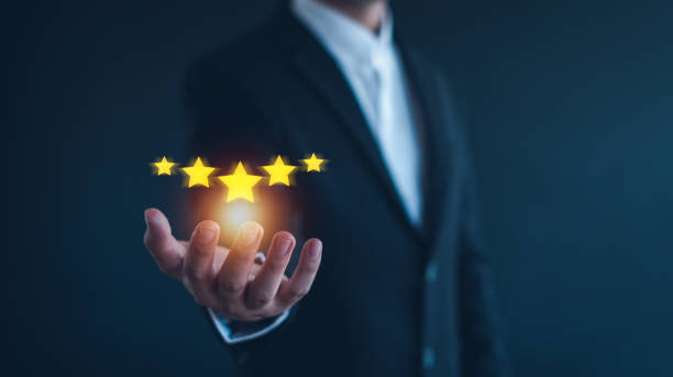 istock Giving a five star rating. Service rating, satisfaction concept.  Customer evaluation feedback, Giving Positive Review for Client's Satisfaction Surveys. 2183989407