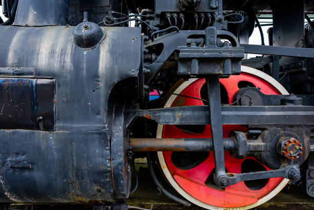 istock Wheels of soviet old steam locomotive class L. 2183991999