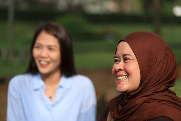 Two  Female Friend Share Moment on the Park, Happy Moment