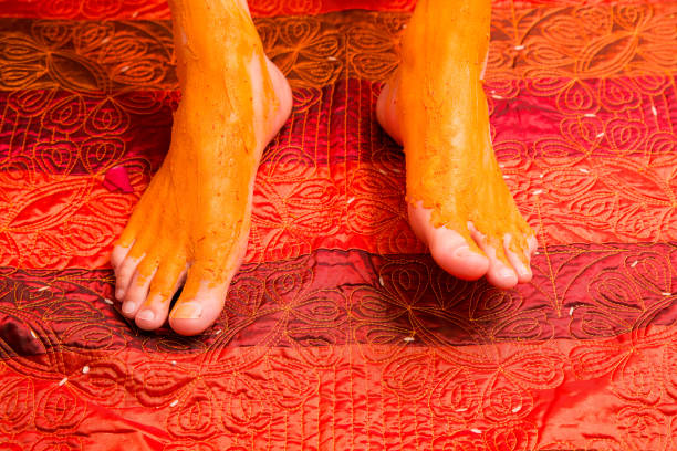 Traditional Indian Wedding Haldi Ceremony - Yellow Paste Applied on Groom's Feet for Blessings