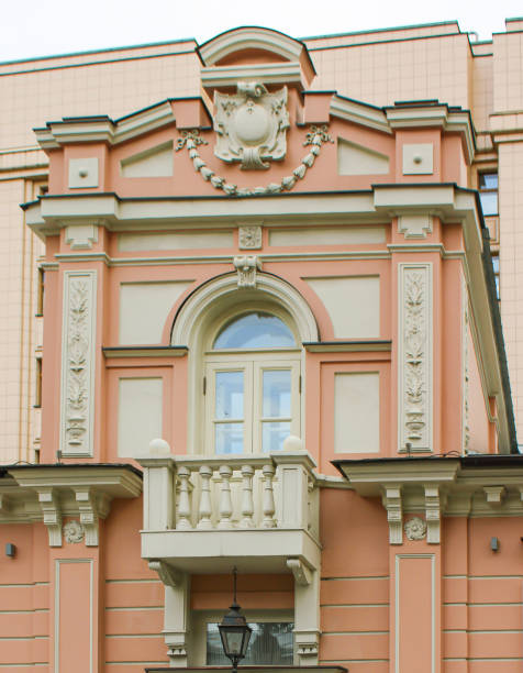istock A stylish pink and white building with a nice balcony and window 2183997066