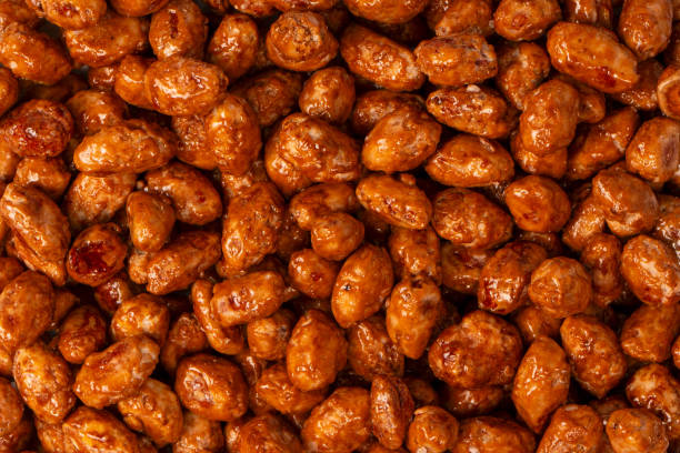 istock Tasty sweet roasted peanuts as a background. 2184001972