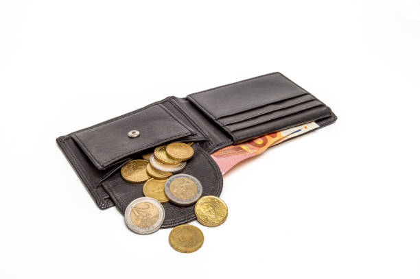 istock Wallet and coins isolated on white background. 2184005385