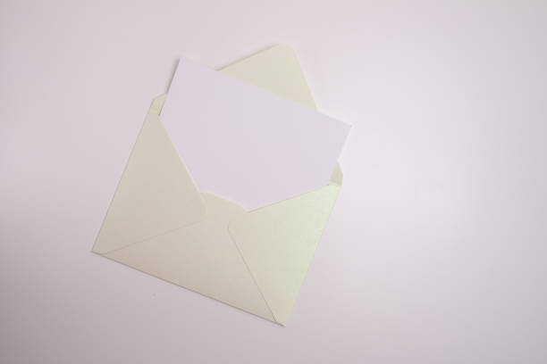 istock Paper envelopes on a light background. New mail, write a message. Send and receive mail. Postal delivery service. Empty envelope, empty space. Communication with people, paperwork. Envelope close-up 2184007519