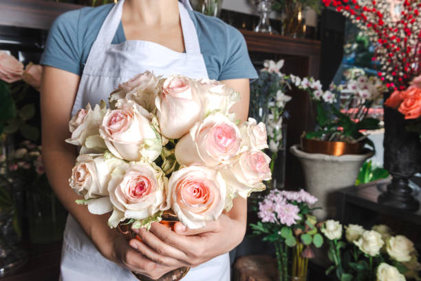 istock Florist Holding Rose Bouquet 2184008848