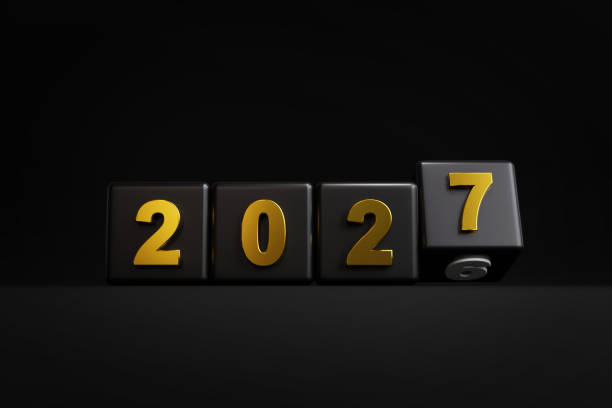 istock Cube with 2026 flips over replaced by the latest 2027 on black background 2184013515