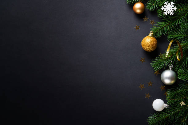 istock Black christmas background with holiday decorations, elegant modern style. 2184013851
