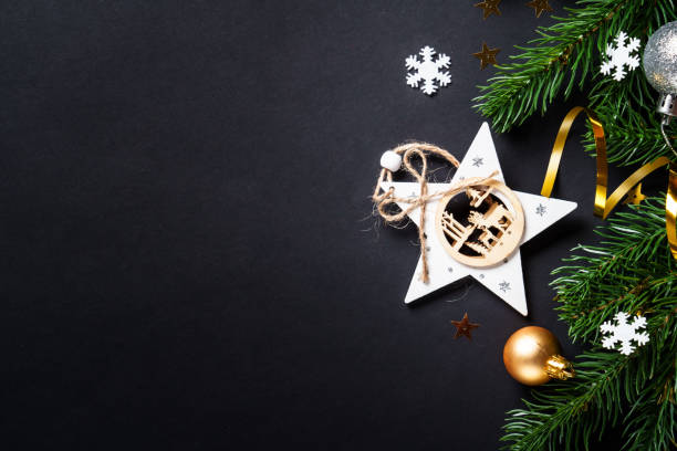 istock Black christmas background with holiday decorations, elegant modern style. 2184013877