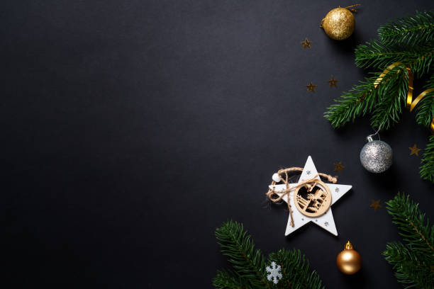 istock Black christmas background with holiday decorations, elegant modern style. 2184013912