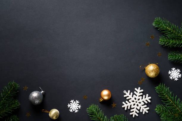 istock Black christmas background with holiday decorations, elegant modern style. 2184013914