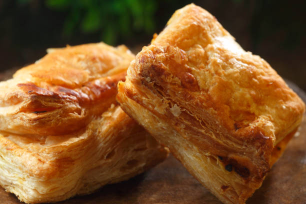 Puff Aloo Patties Aloo patties are a delicious and popular Indian snack made with spiced mashed potatoes wrapped in a crispy, flaky outer layer. indian bakeries stock pictures, royalty-free photos & images