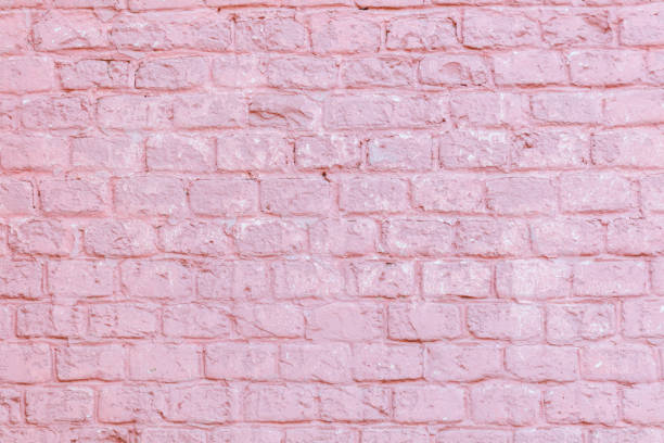 istock A pink brick wall with a white brick border 2184020852