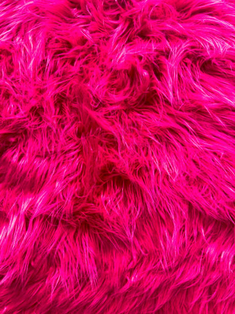 istock A pink fur texture with a shiny appearance 2184021700