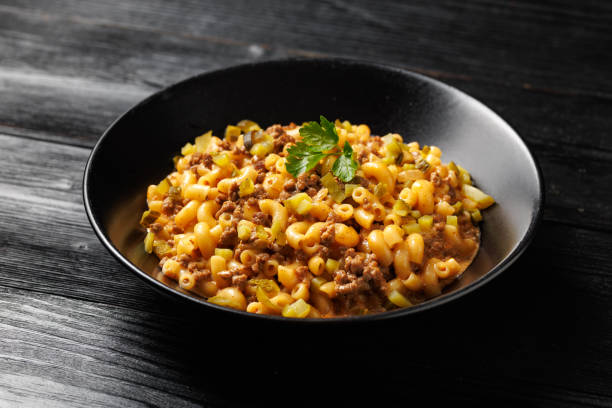 istock Cheeseburger Pasta with beef, melted cheese, gherkins and pasta 2184030861