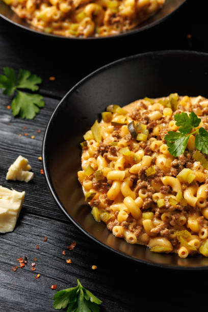 istock Cheeseburger Pasta with beef, melted cheese, gherkins and pasta 2184030894