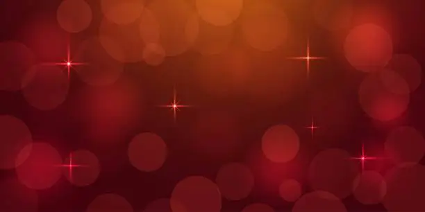 Weihnachtliche Textur. Goldene Highlights und Funken auf rotem Hintergrund. Der Bokeh-Effekt. Weihnachtliche Textur. Goldene Highlights und Funken auf rotem Hintergrund. Der Bokeh-Effekt.