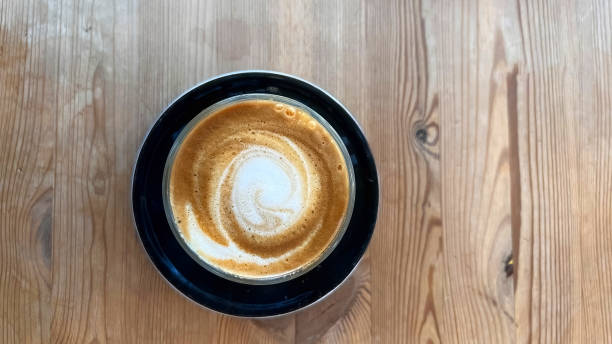istock A cortado drink served on a wooden table. 2184048865