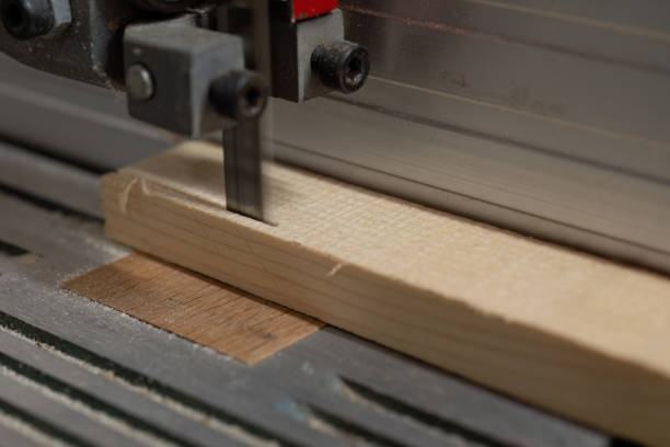 istock Wood Cutting on Band Saw in Workshop 2184050001
