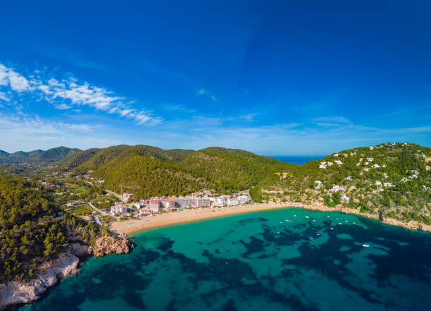 istock Ibiza, Balearics, Spain - Cala de San Vincente or Sant Vincent, bay with beach 2184064196