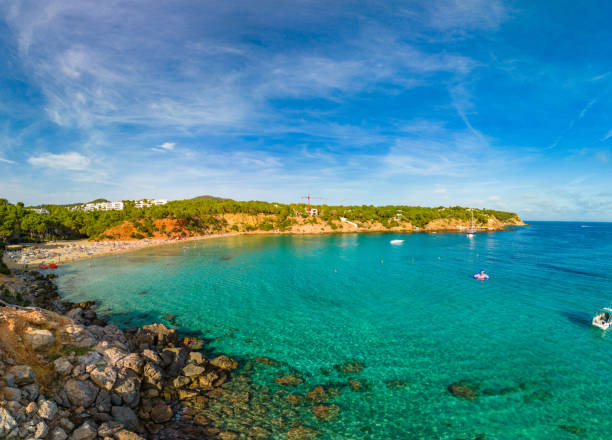 istock Cala Llenya, Ibiza with turquoise water in Balearic 2184064217