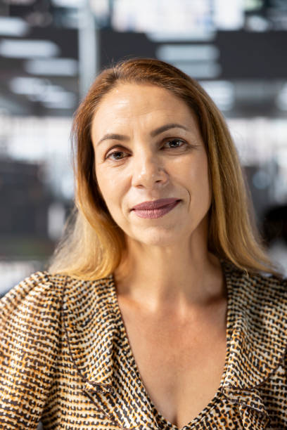 istock Female executive reviewing business operations at her desk 2184070237
