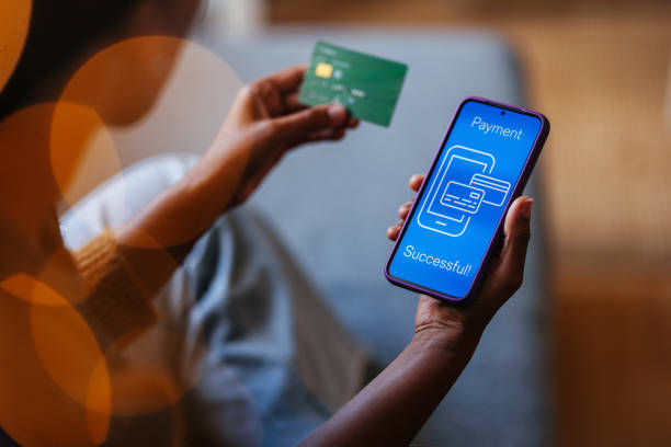 istock Person Completing a Successful Mobile Payment with Credit Card 2184072683