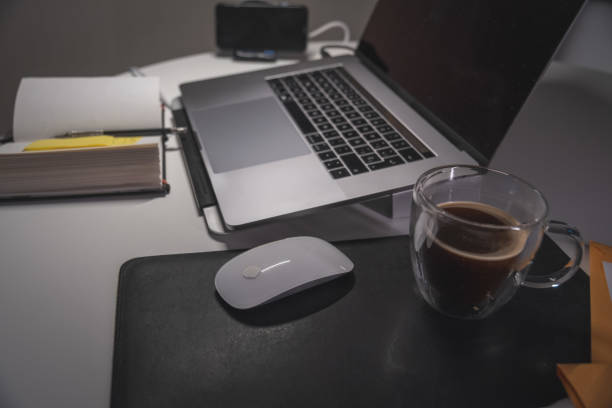 Woman hands Using Laptop Working on desk office