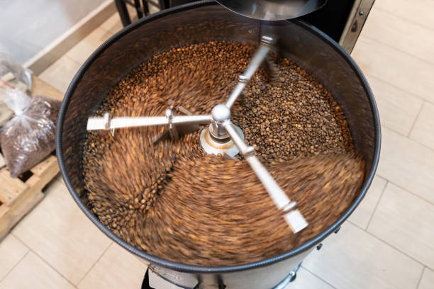 istock Blur of moving coffee beans being roasted 2184073145
