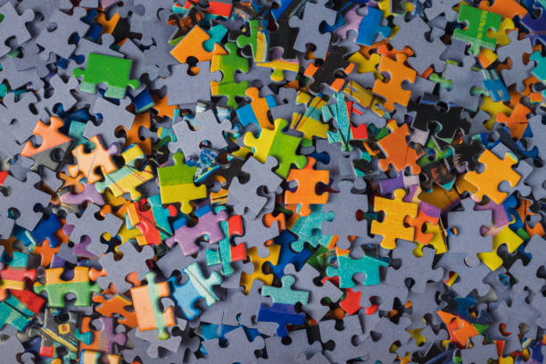 istock A pile of jigsaw puzzle pieces over the entire frame 2184073861