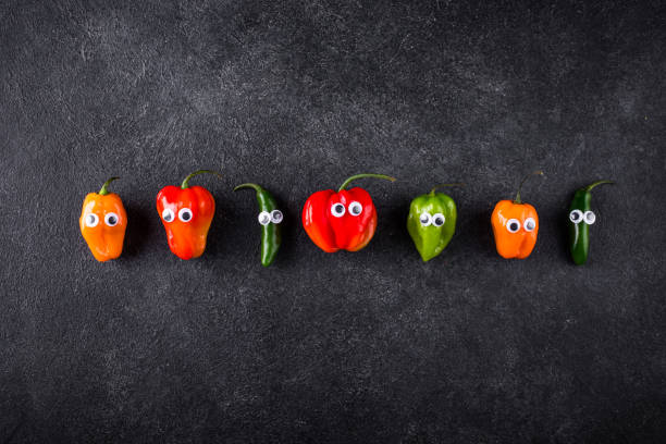 istock Cute color bell pepper with eyes. 2184074839