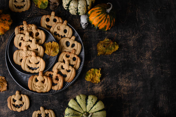 istock Halloween cookies in shape of jack-o-lantern 2184074853