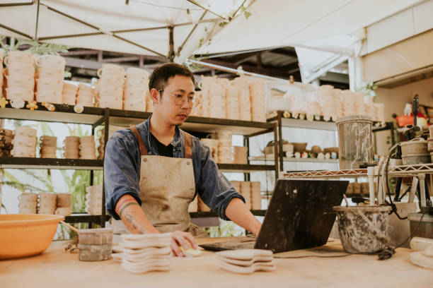 istock A freelance potter is using IOT, online marketing to help promoting his works. 2184076042
