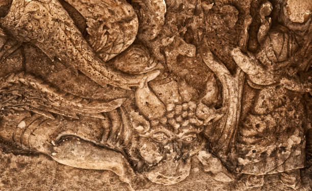 Bas-relief detail depicting the main bronze door of the MIlan Cathedral (il Duomo) Italy