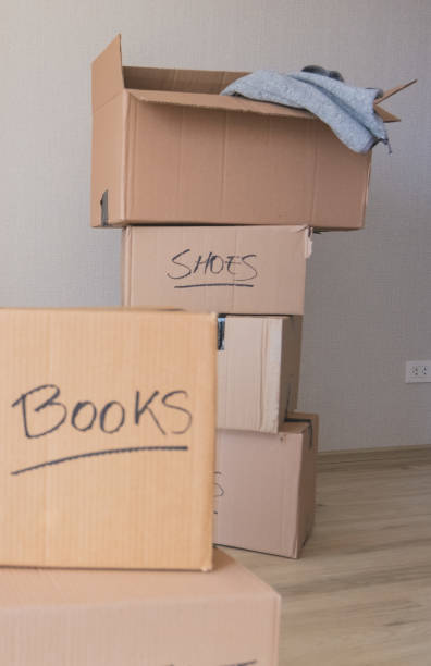 Close-Up Of Brown Cardboard Box Against White Background