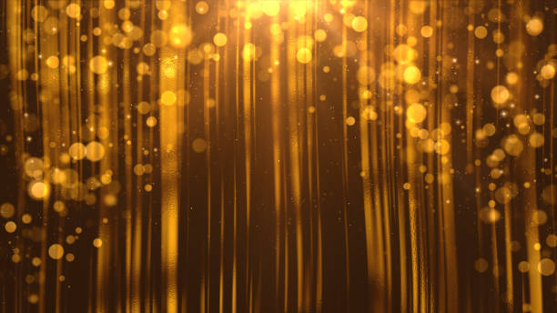istock Glowing golden bokeh and light streaks create a warm, abstract background perfect for festive designs, celebrations, or elegant backdrops. 3d Rendering 2184079362