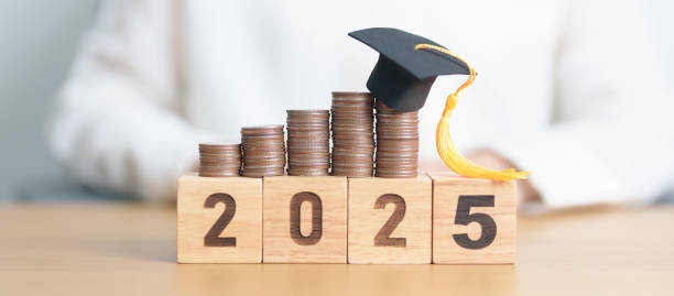istock Happy New Year 2025 with Coins stack growing up and graduation hat. Money saving for Education, Scholarship, Student loan and debt and study future plan concept 2184082008