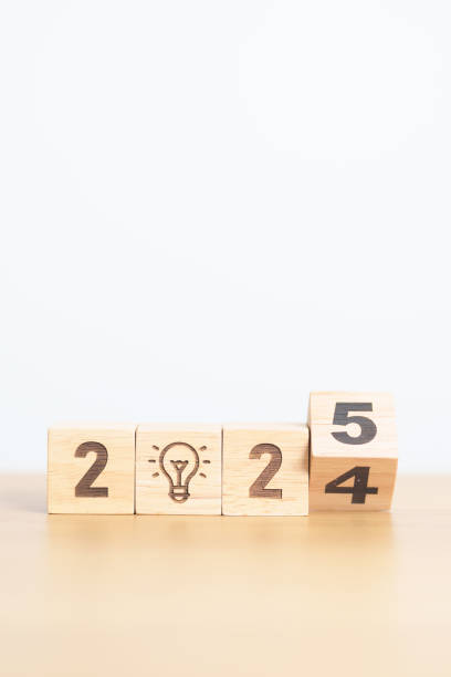 istock 2024 year change to 2025 year block with lightbulb. Business Idea, Creative, Thinking, brainstorm, Goal, Resolution, strategy, plan, Action, change and New Year start concepts 2184082598