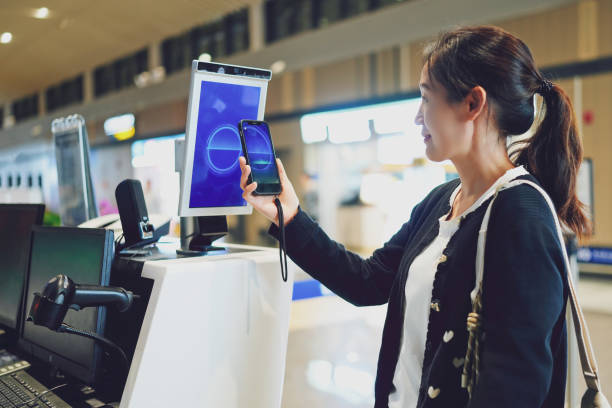 istock Modern Digital Check-In Experience at an Airport with Mobile Technology 2184087741