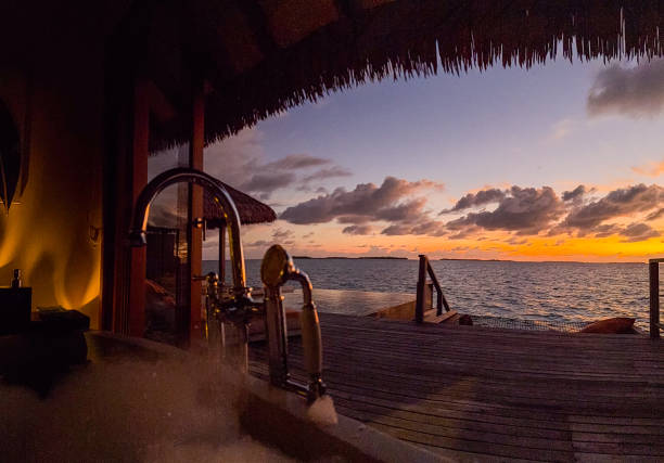 istock Sunset views from overwater pool villa in Maldives 2184088661