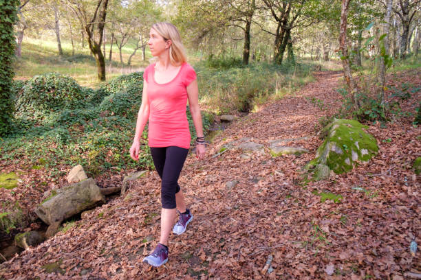 woman walking in the forest