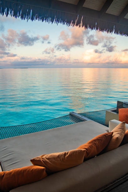 istock Sunset views from overwater pool villa in Maldives 2184089465