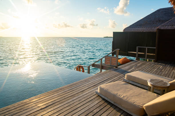 istock Sunset views from overwater pool villa in Maldives 2184089545