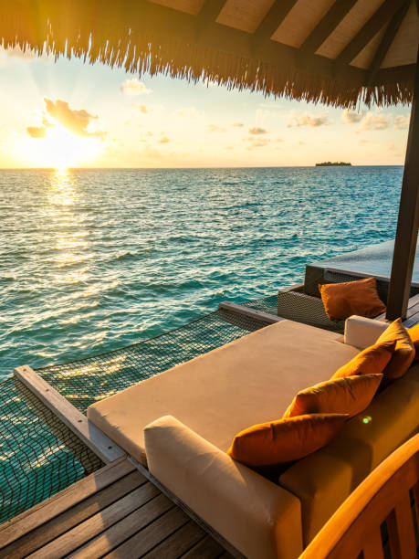 istock Sunset views from overwater pool villa in Maldives 2184089631