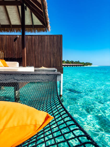 istock Sunset views from overwater pool villa in Maldives 2184089764