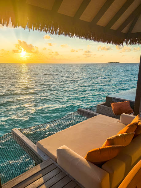 istock Sunset views from overwater pool villa in Maldives 2184090512