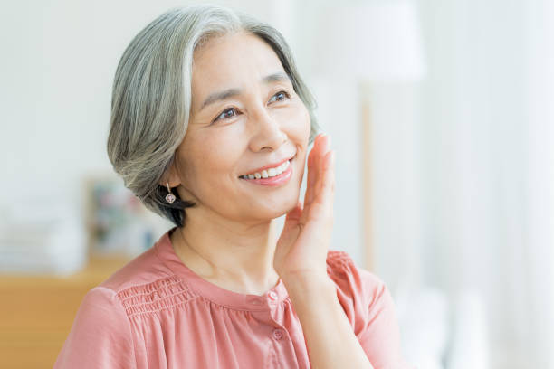 istock Senior woman doing skin care 2184093492