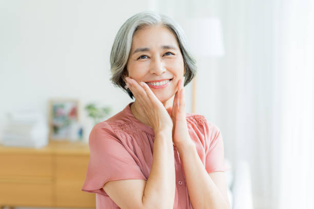 istock Senior woman doing skin care 2184093493