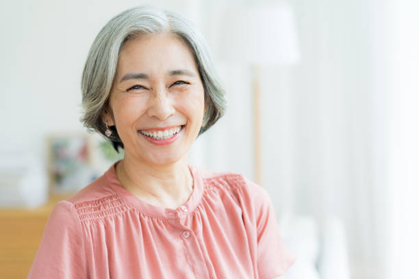 Senior woman doing skin care