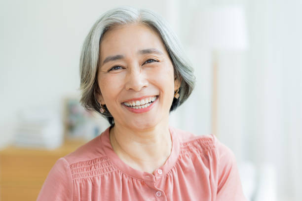 istock Senior woman doing skin care 2184093503