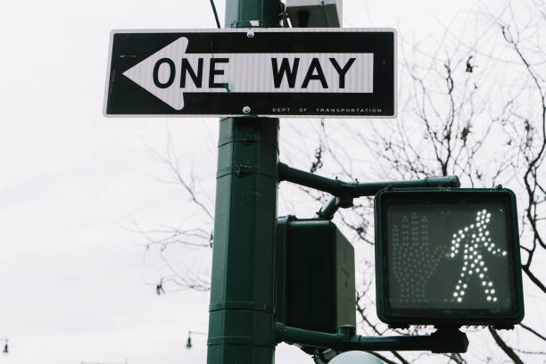 istock One Way Signal Pedestrian Signal clearly displayed in a bustling Urban Setting 2184096647